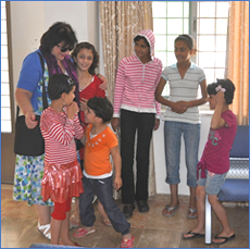 one of the Charity's representatives with some of the girls